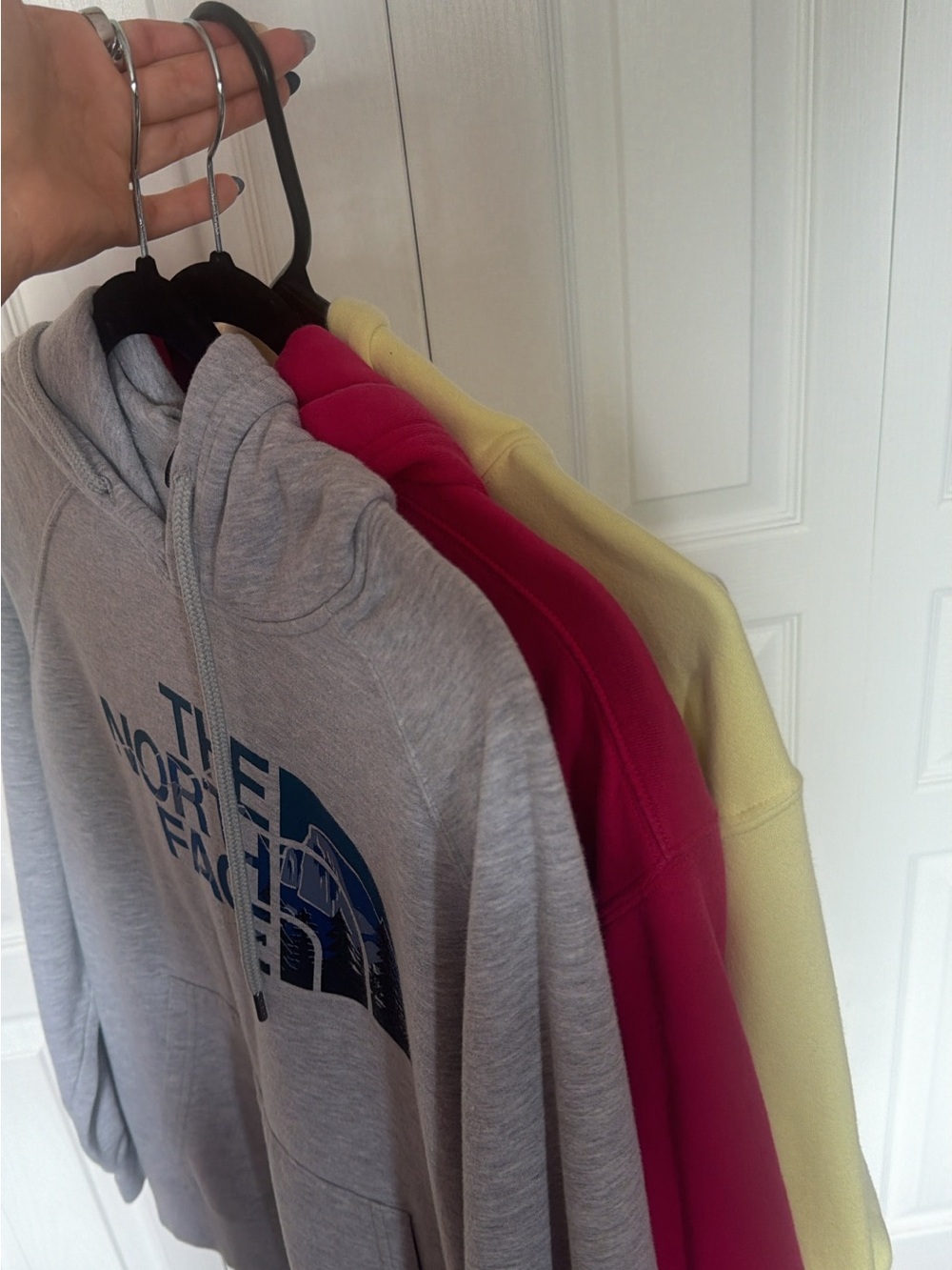 The North Face Grey Hoodie with Blue Logo, Pink and Yellow Layered Hoodies